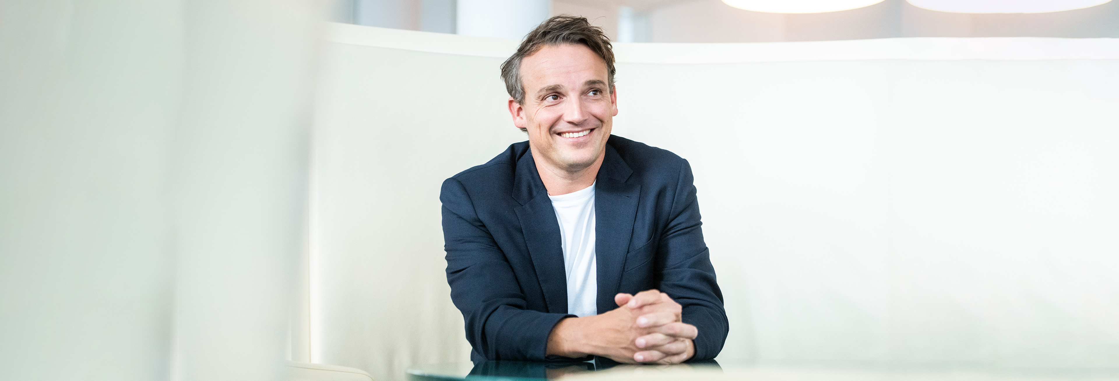 Mr. Klein is smiling